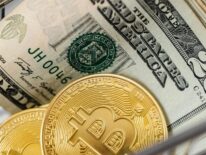 Bitcoin and dollar bills in cart.