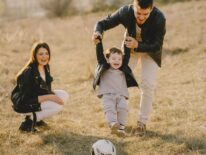 Two loving parents with their child who is diagnosed with autism