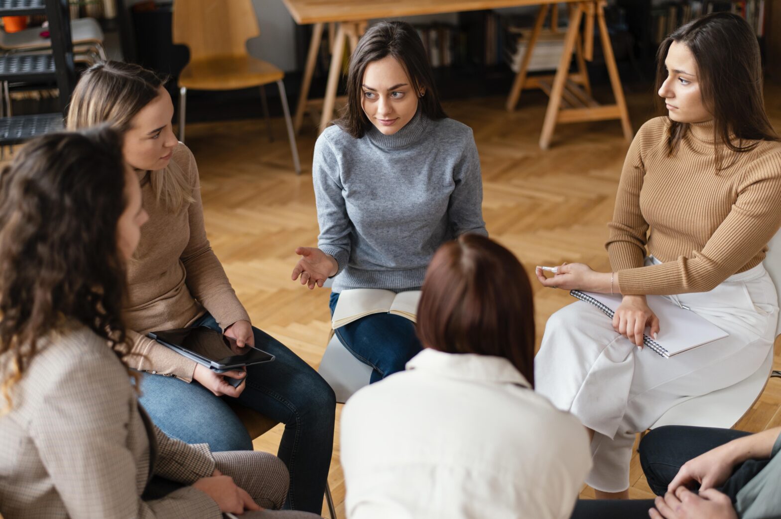 Young women in a group discussion.