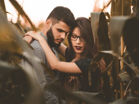 A couple embraces. Premarital counseling can provide the skills and support you need to create a strong and healthy union.