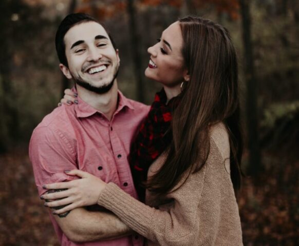 A happy couple laughing together and feeling close after couples therapist in Houston and The woodlands TX