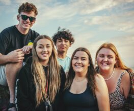 Teenagers smiling after beginning youth counseling with a youth therapist in Houston, TX area. Teen therapy can address anxiety, depression, self-esteem issues and many more.